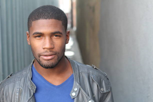 istock Gorgeous African man close up with copyspace 802649042