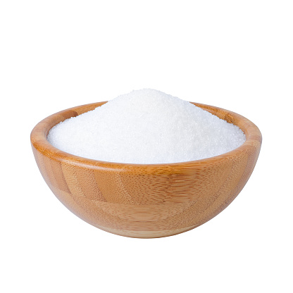 wooden bowl with sugar granulated isolated on white background