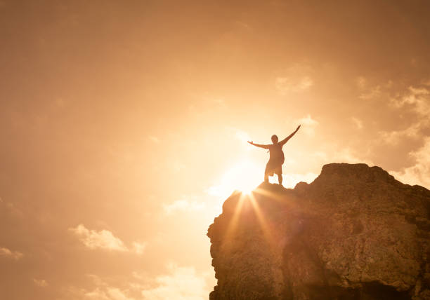 istock Man on the peak of the mountain 802649880