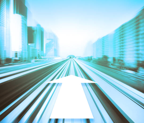 istock Dubai metro station, motion and zoom blur, arrow pointing forward 802662332