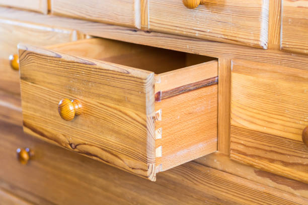 istock One old wooden drawers opened as seen from the front 802673934