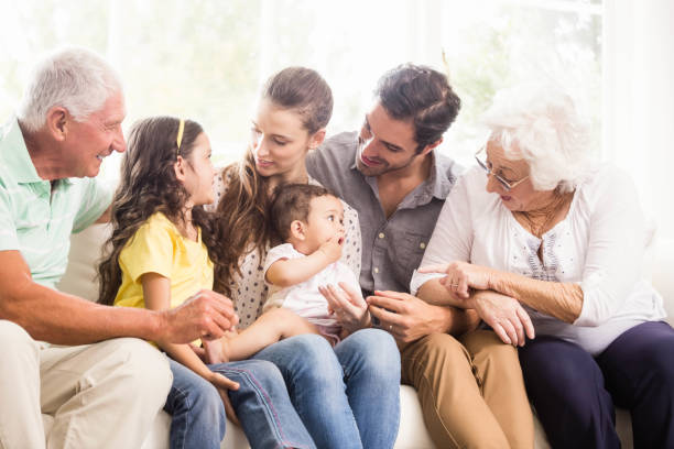 istock Happy extended family smiling 802674430