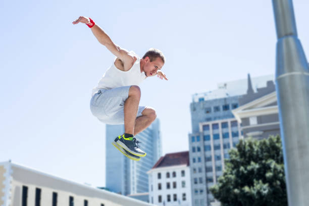 istock Man doing parkour in the city 802674812