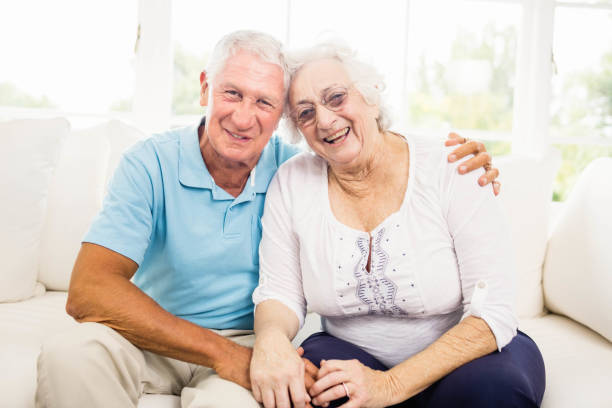 istock Cute senior couple smiling 802674902