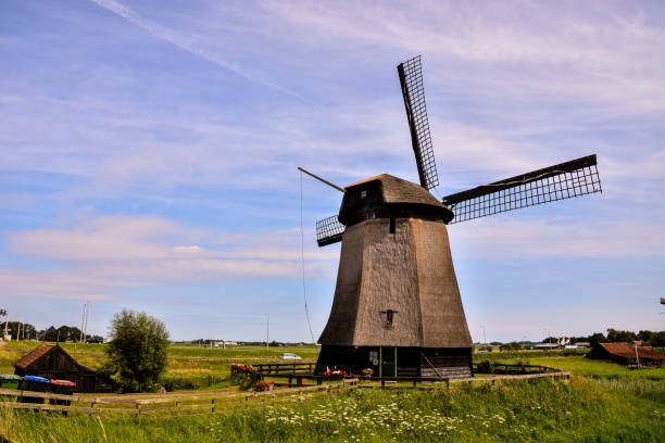 classic vintage windmill in holland - clayton imagens e fotografias de stock