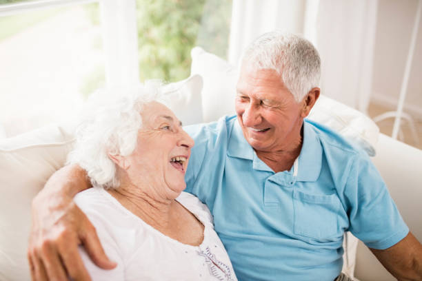 istock Cute senior couple hugging 802701346