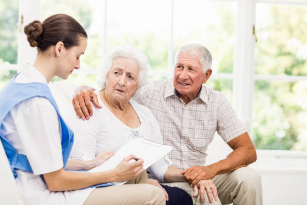 istock Nurse taking care of sick elderly patients 802702000