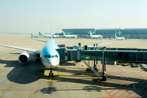 Seoul, Korea - March 15, 2017: Korean Air planes at departure gates at Incheon International Airport the largest airport in South Korea, the primary airport serving the Seoul Capital Area, and one of the largest and busiest airports in the world.