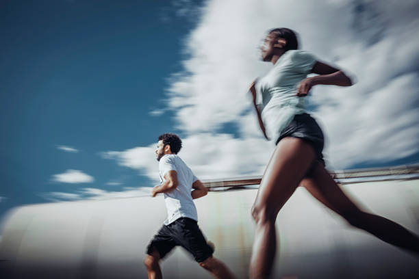 istock Joggers running outdoors 802763630