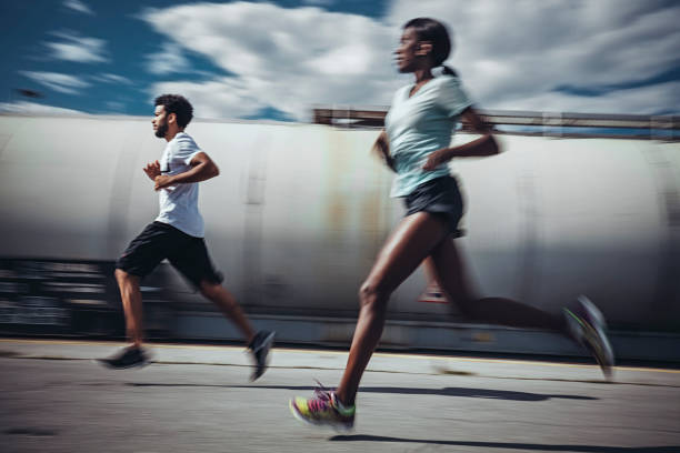 istock Joggers running outdoors 802763702