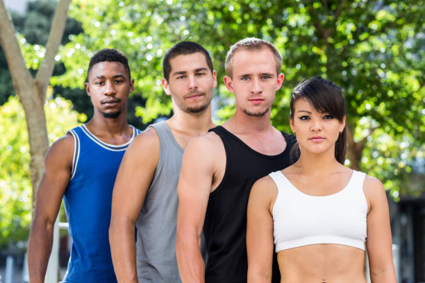 istock Portrait of extreme athletes standing in a row 802772494