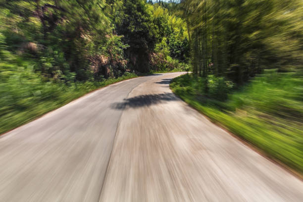 istock concrete road in the sunny day 802775342