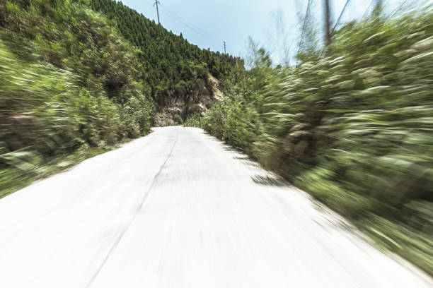 istock concrete road in the sunny day 802780204