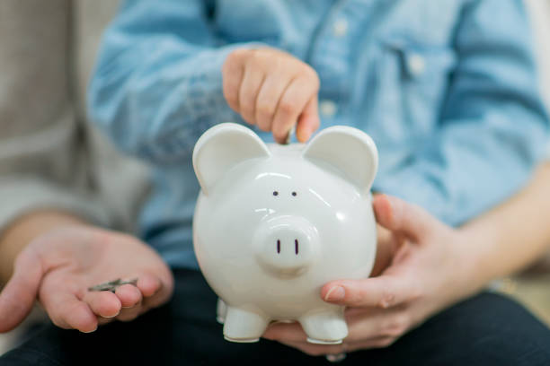 istock Putting Money in the Bank 802798980