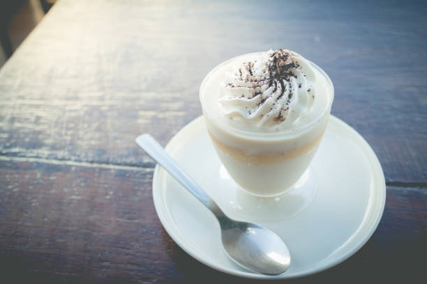 istock Delicious milk pudding with grated chocolate over napkin 802799162