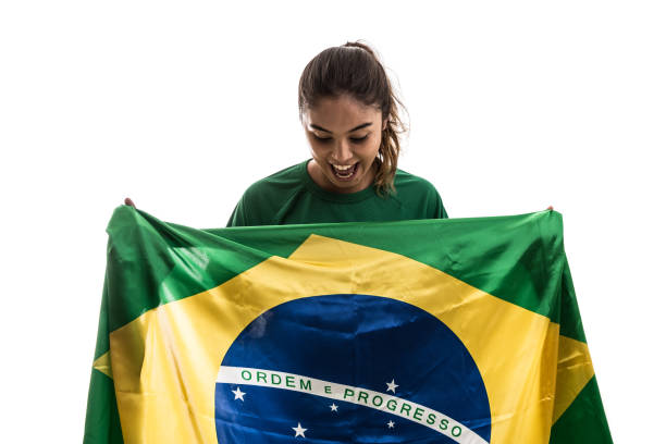 istock Brazilian fan celebrating on white background 802807290