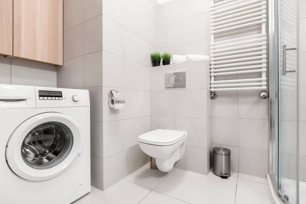 istock Bathroom with washer and shower 802814374