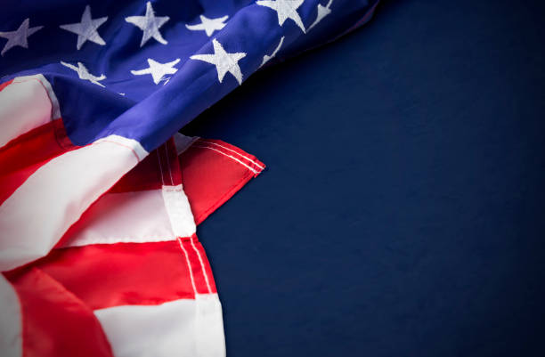 istock USA or america flag isolated on blue background with clipping path 802824622