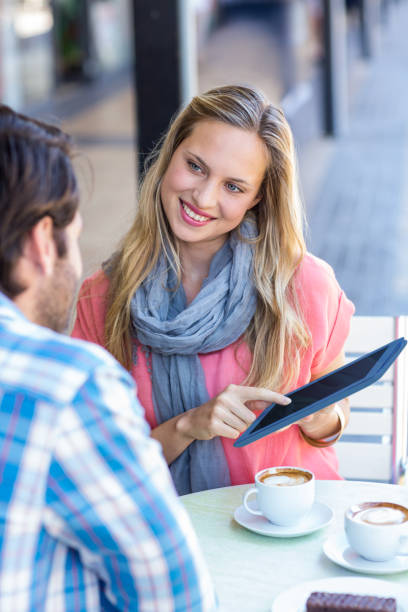 istock Couple looking at the tablet 802832600