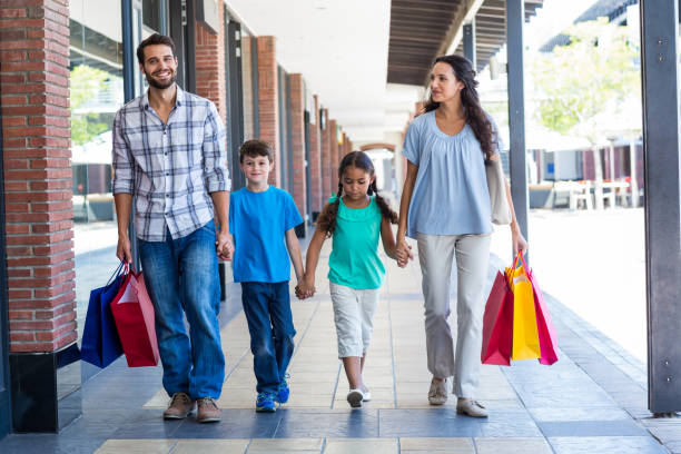 istock Happy family having fun in the mall 802833248