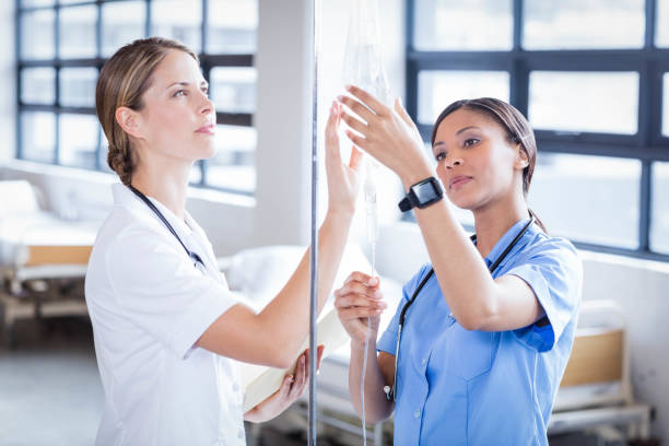 istock Medical team preparing an IV drip 802833388