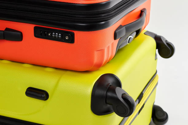 istock Yellow, orange suitcases close up. 802840502