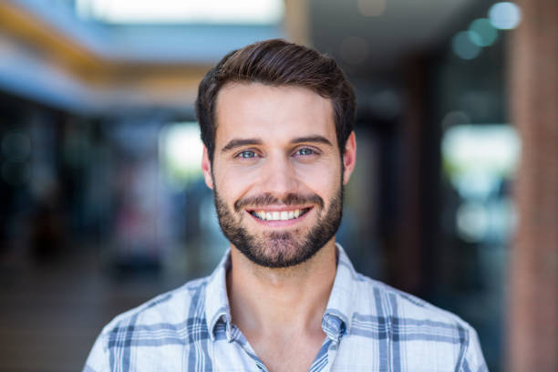 istock Portrait of happy smiling man 802843586