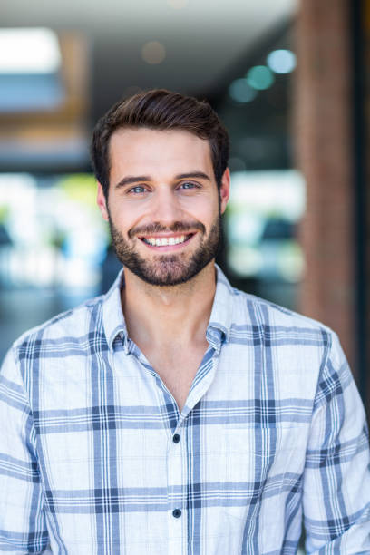 istock Portrait of happy smiling man 802843618