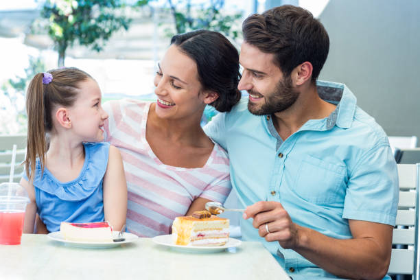 istock A family eating at the restaurant 802843826