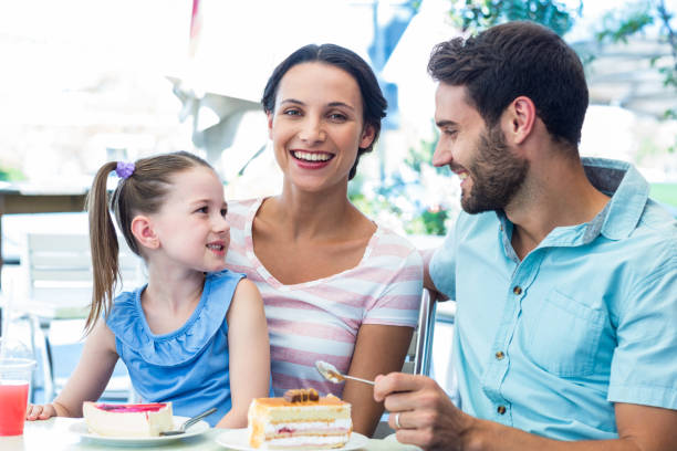 istock A family eating at the restaurant 802843832