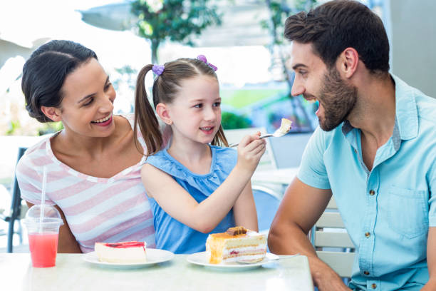 istock A family eating at the restaurant 802843842