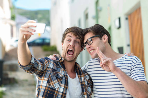 istock Hip friends taking selfie 802846058