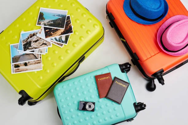 istock Colorful suitcases for family trip. 802846438
