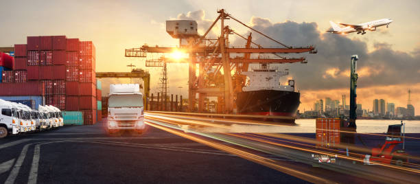 istock Logistics and transportation of Container Cargo ship and Cargo plane with working crane bridge in shipyard 802854778