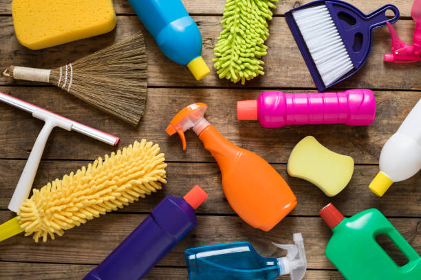 istock House cleaning product on wood table 802857122