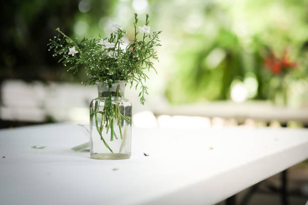 istock Beautiful flowers in vase decoration on the table 802884492