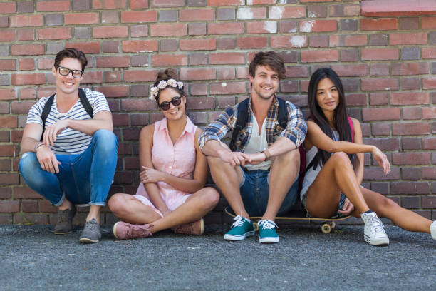istock Hip friends sitting on the floor 802886114
