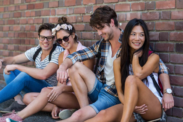 istock Hip friends sitting on the floor 802886142