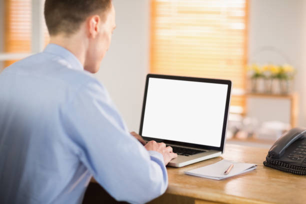 istock Businessman working on his laptop 802899276