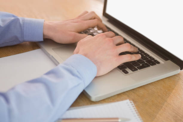 istock Businessman working on his laptop 802899368