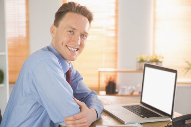 istock Happy businessman working with laptop 802899544