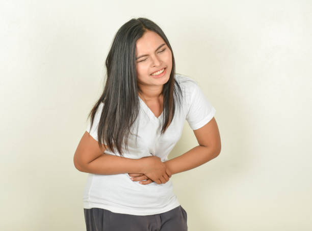 istock stomachache  in women 802912548