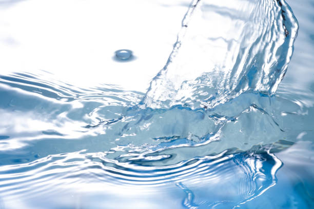 istock Close up pure water splash Abstract background 802915064