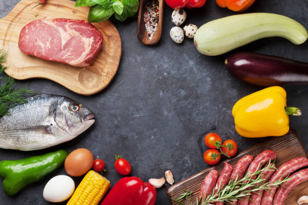 istock Vegetables, fish and meat cooking 802915110