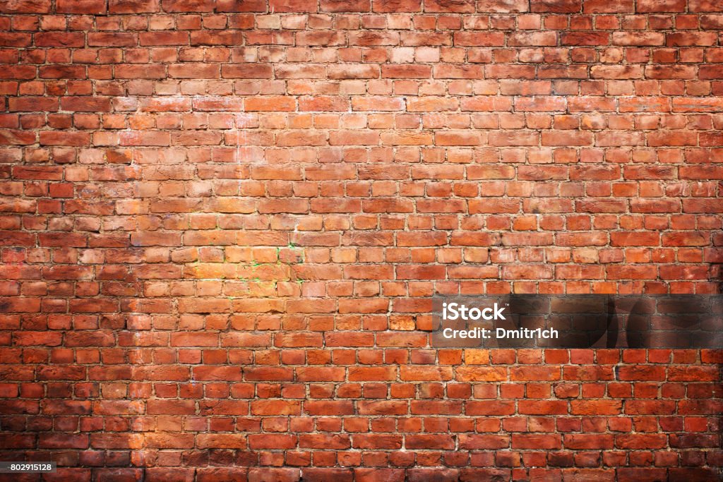 texture vintage brick wall, background red stone urban surface Old brick wall, old texture of red stone blocks closeup Brick Wall Stock Photo