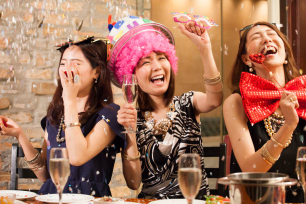 istock The girls enjoy in confetti snow. 802920762