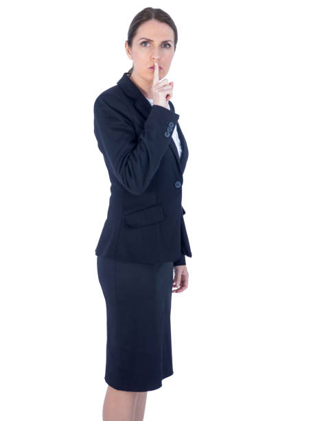 istock Pretty businesswoman asking for silence 802923572