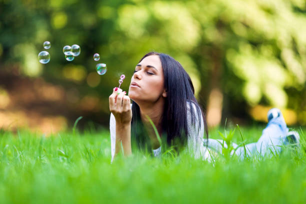 istock Beautiful woman in forest 802924058