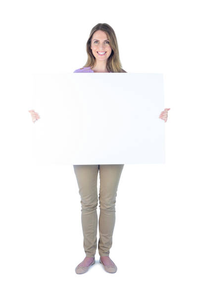 istock Businesswoman showing a blank sign 802941386