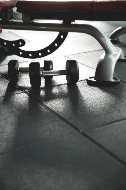istock Dumbbells with seat in the Gym 802944676